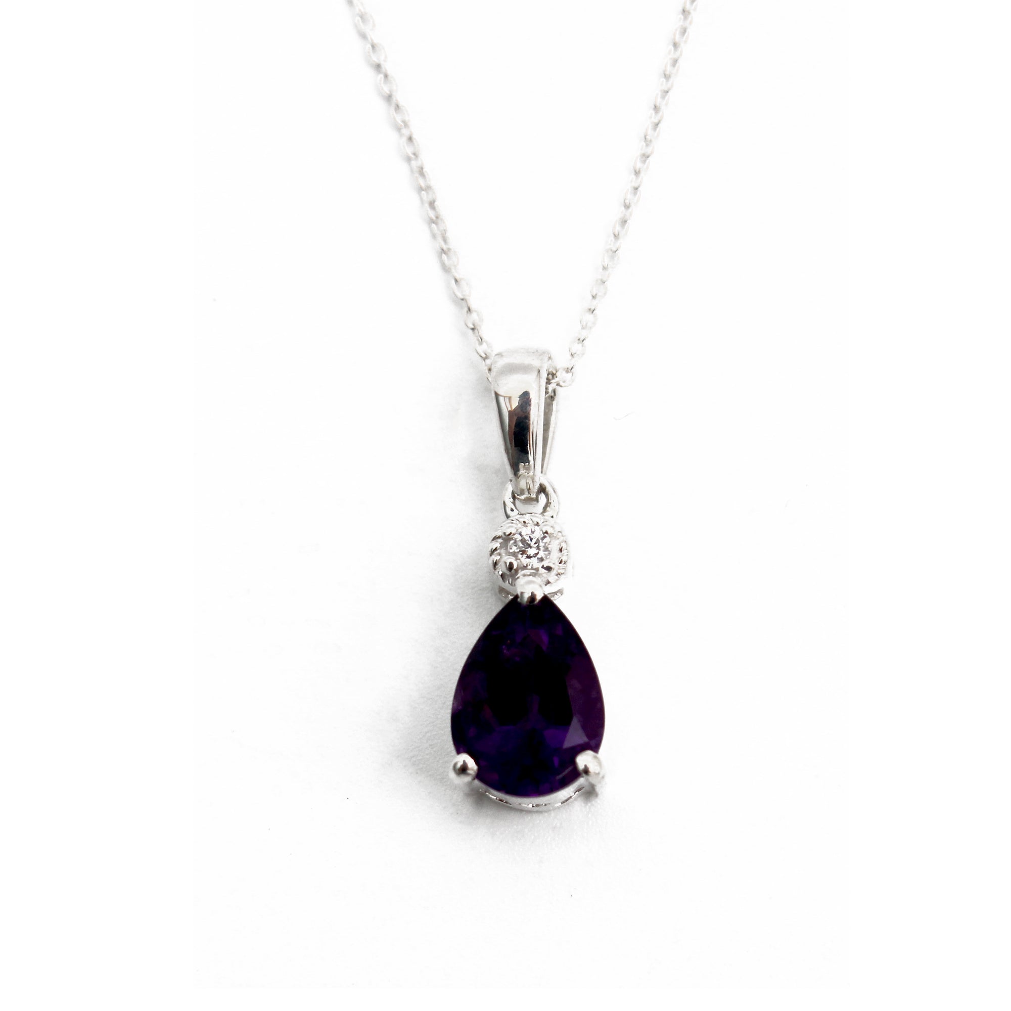 Purple ale Natural Amethyst pendant (Comes with a complimentary Silver Chain)