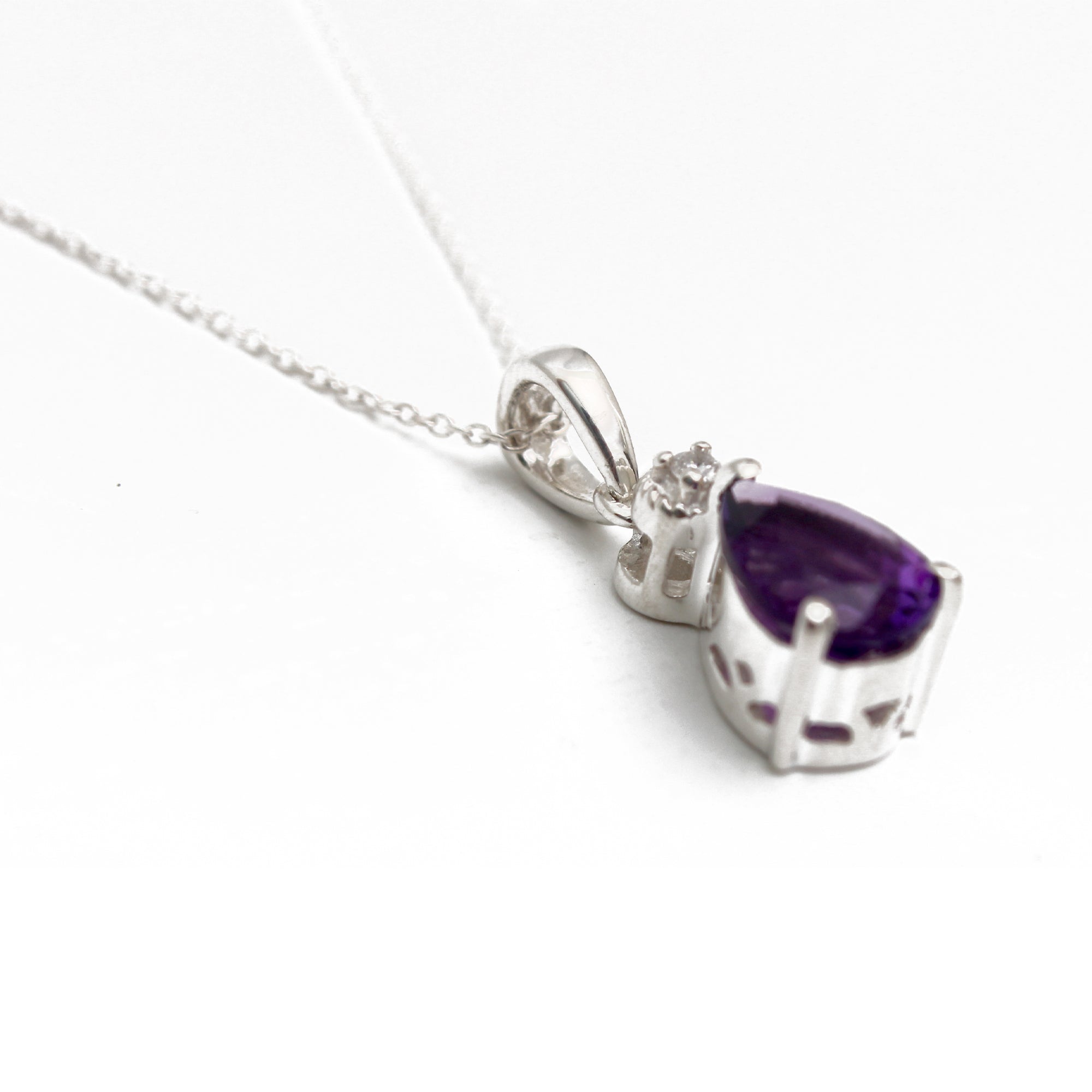 Purple ale Natural Amethyst pendant (Comes with a complimentary Silver Chain)