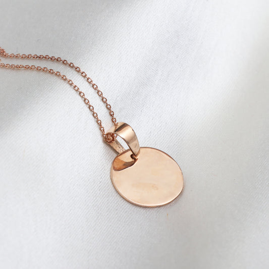 Empty coin pendant