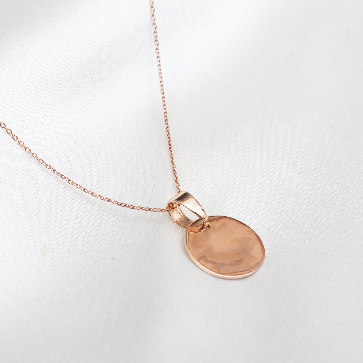 Empty coin pendant